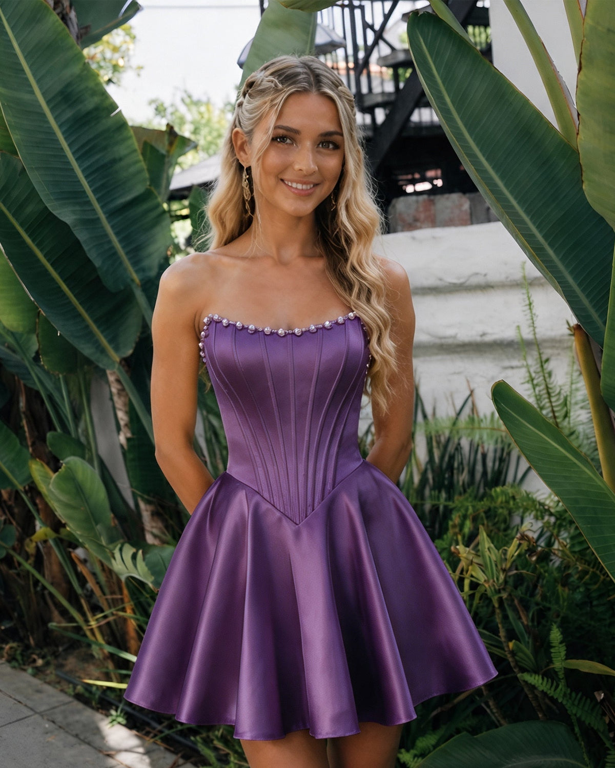 Strapless satin homecoming dress with pearl trim, corset bodice, flared skirt—plum purple