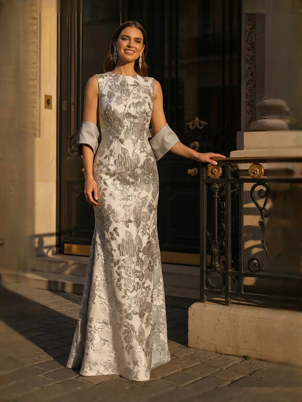 Ivory floral mermaid gown with scoop neck, sleeveless bodice, fitted floor-length skirt