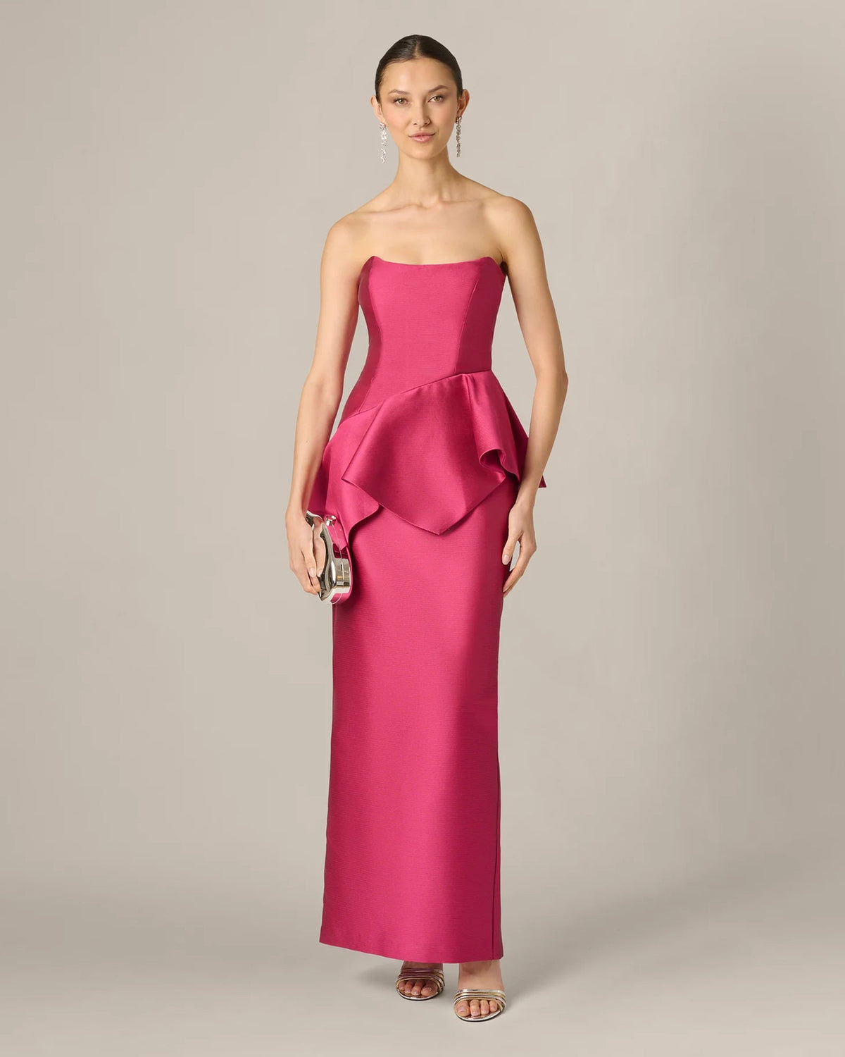 Bright rose strapless maxi dress with flowing front ruffle peplum