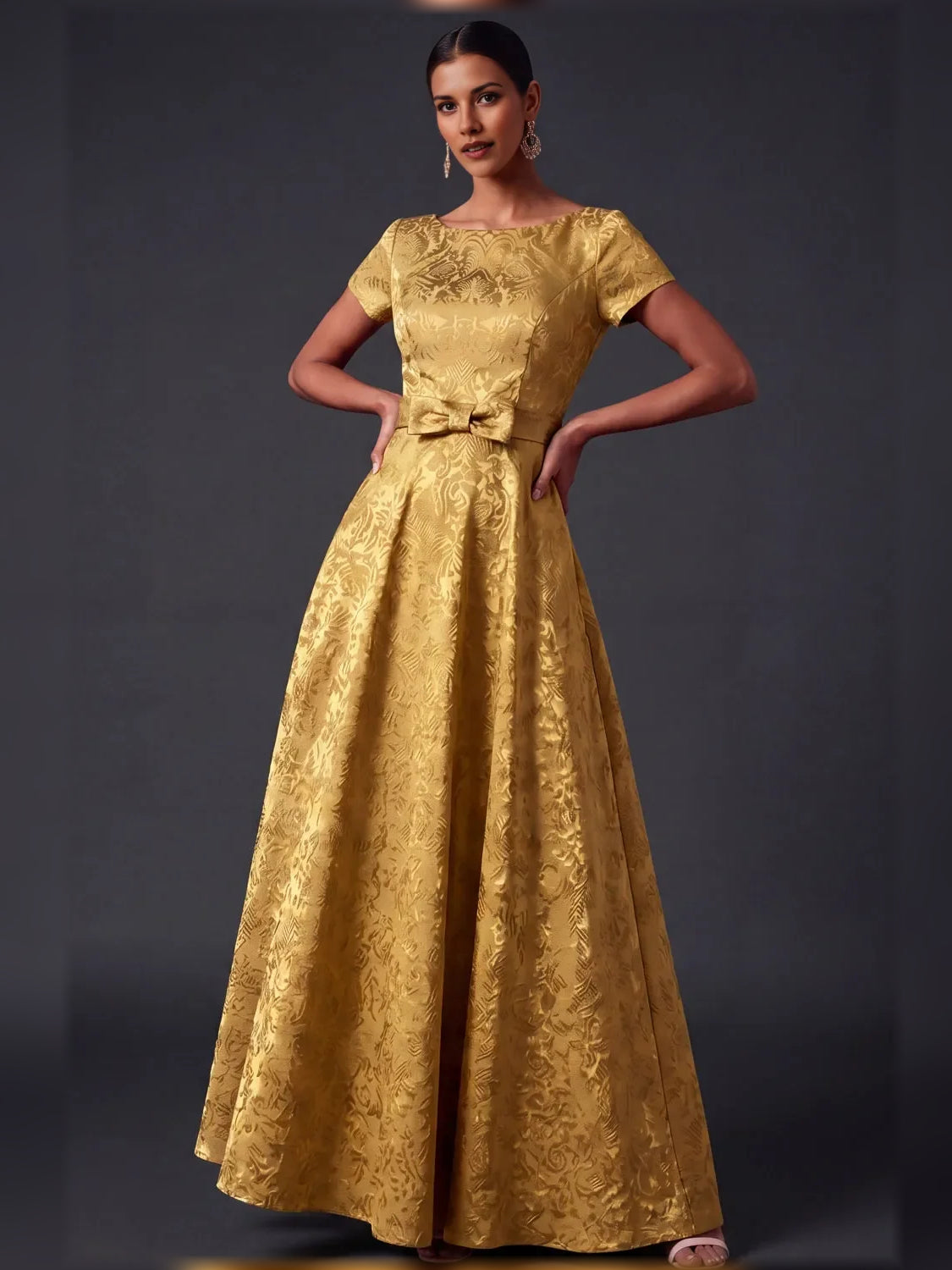 Gold short A-line dress with bateau neckline and bow-waist detail, side pose