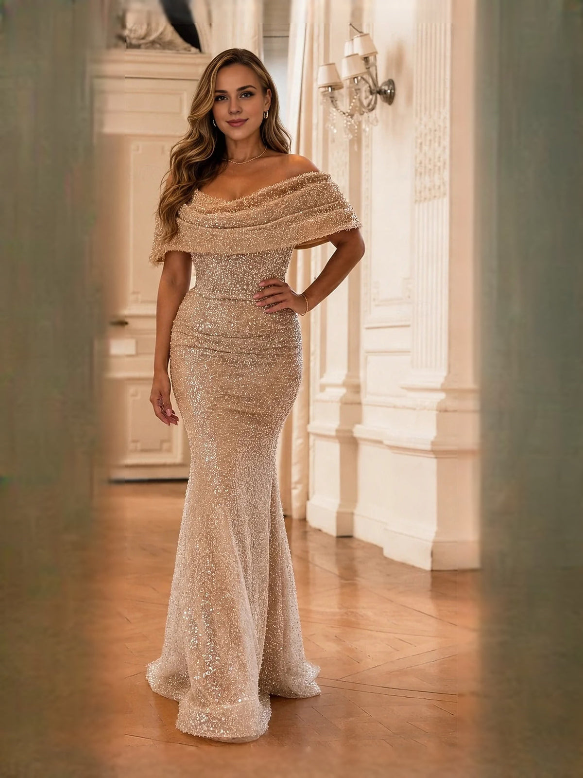 Gold off-shoulder ruched mermaid maxi dress with ruffled neckline and glittery tulle