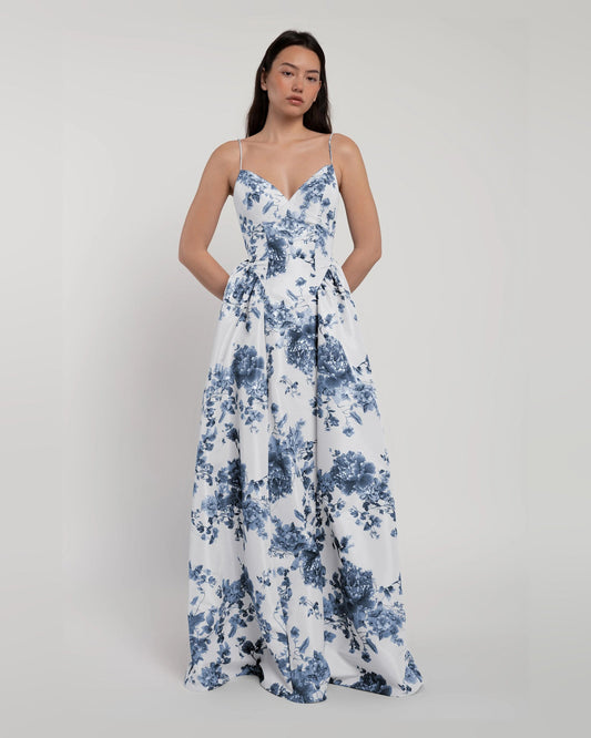 Blue floral A-line maxi dress with V-neck, spaghetti straps, pleated full skirt