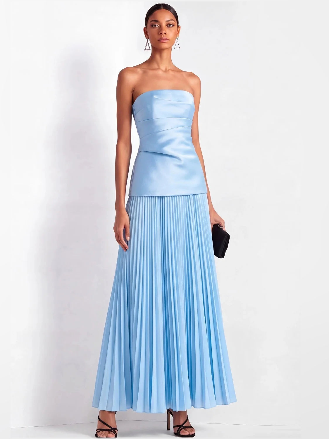 Front view of light blue strapless satin column maxi dress with pleated skirt