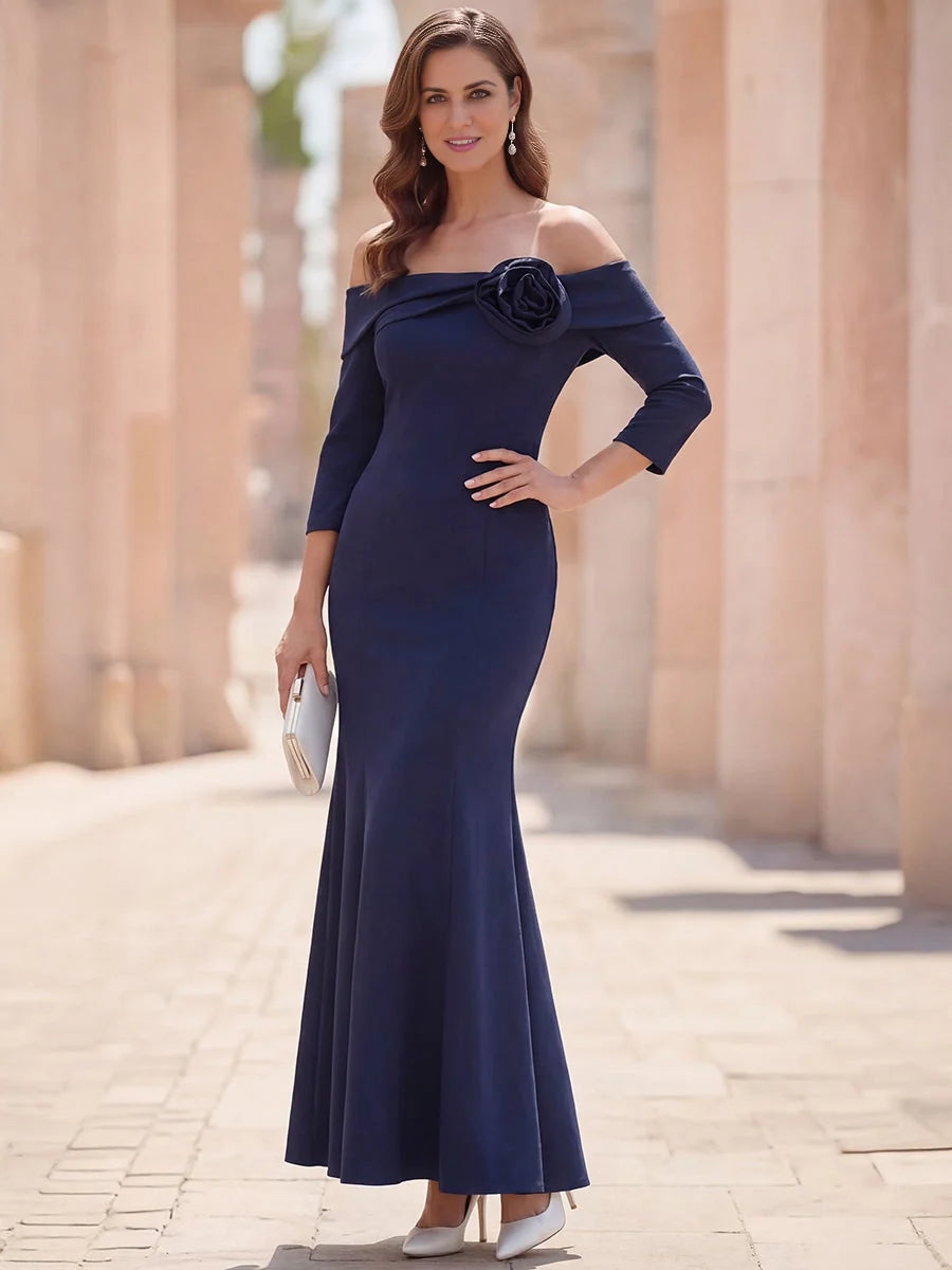 Dark blue off-shoulder mermaid maxi dress with rosette accent and three-quarter sleeves