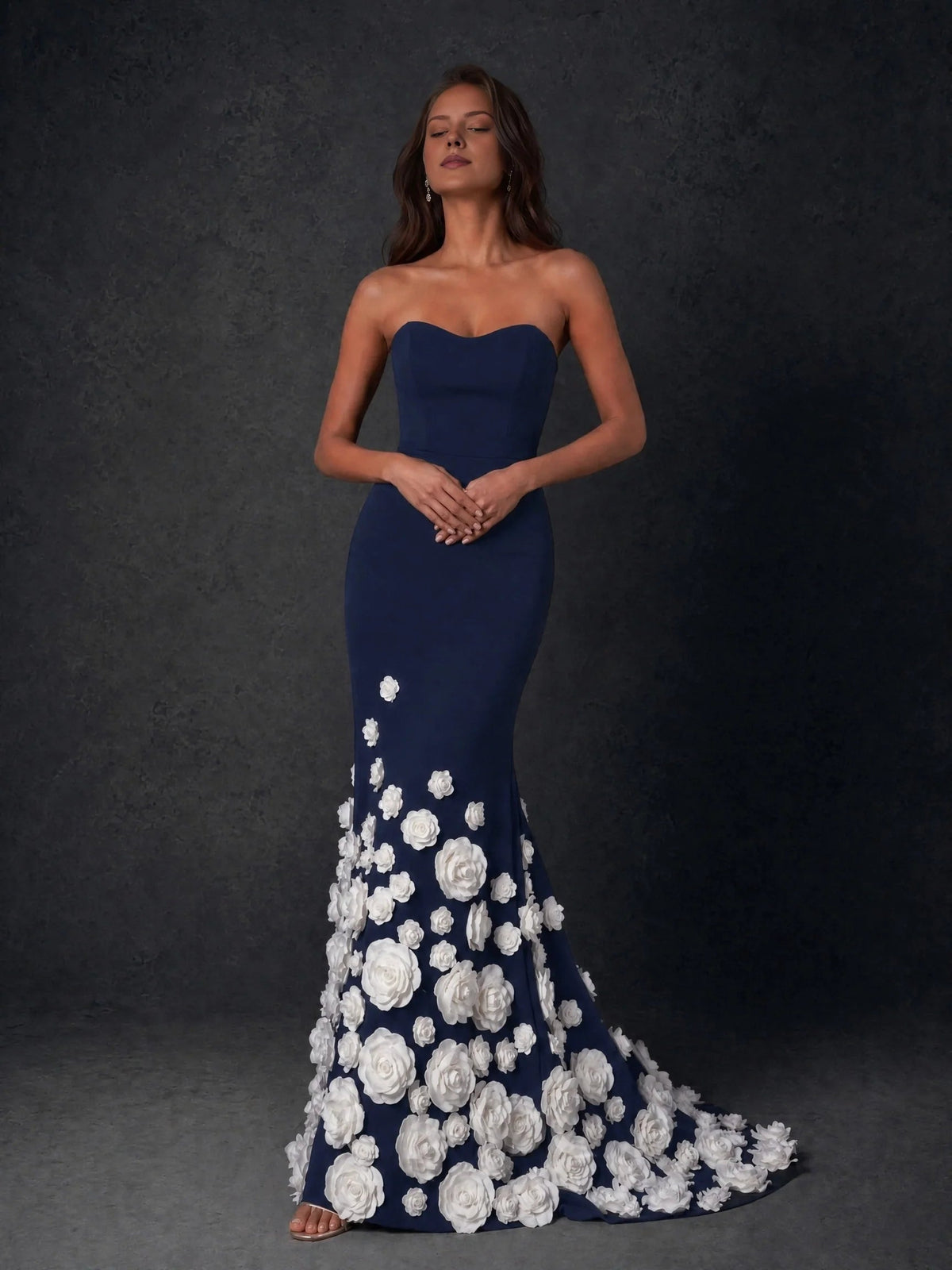 Navy blue strapless sweetheart floor-length formal dress with floral appliqué