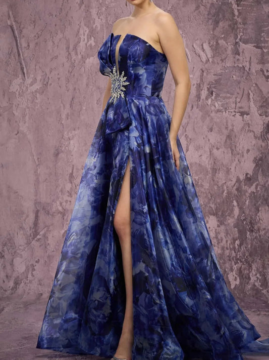 Navy strapless maxi dress with side slit and blue watercolor floral print skirt
