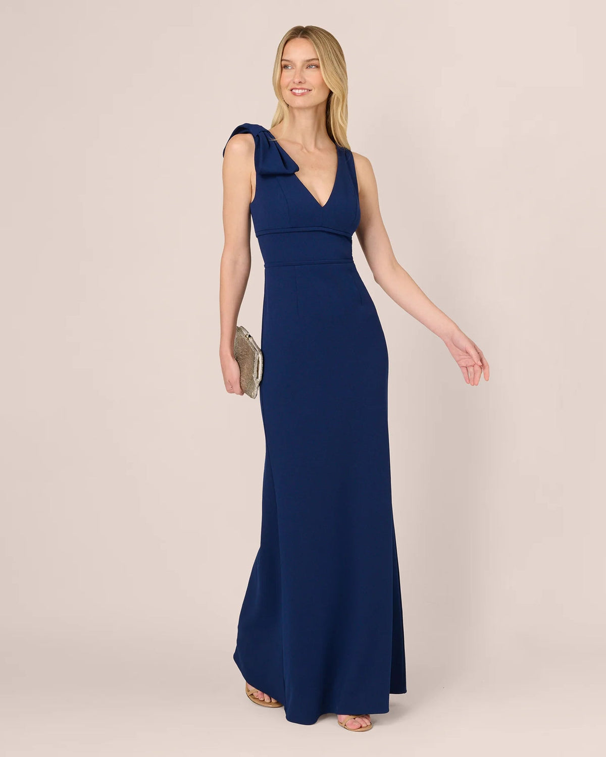 Navy blue sleeveless V-neck A-line maxi dress with shoulder bow detail