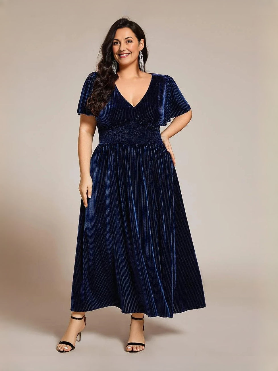 Navy blue velvet midi A-line dress with V-neck and gathered waist, short flutter sleeves