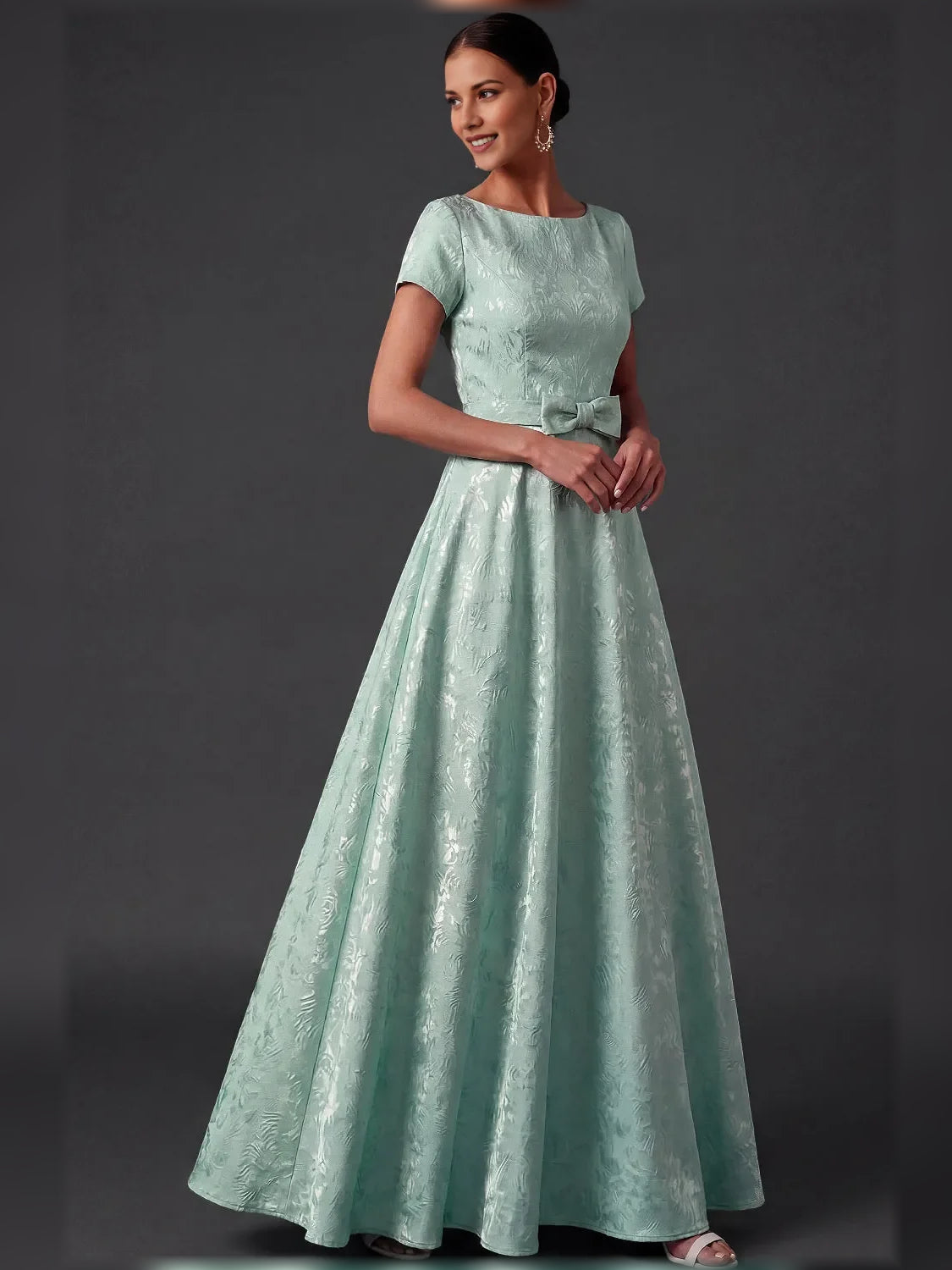 Mint green short A-line dress with bateau neckline, textured fabric and cap sleeves