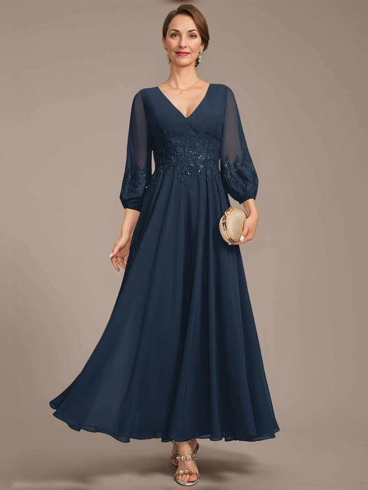 Dark navy V-neck A-line chiffon dress with beaded bodice and flowing floor hem