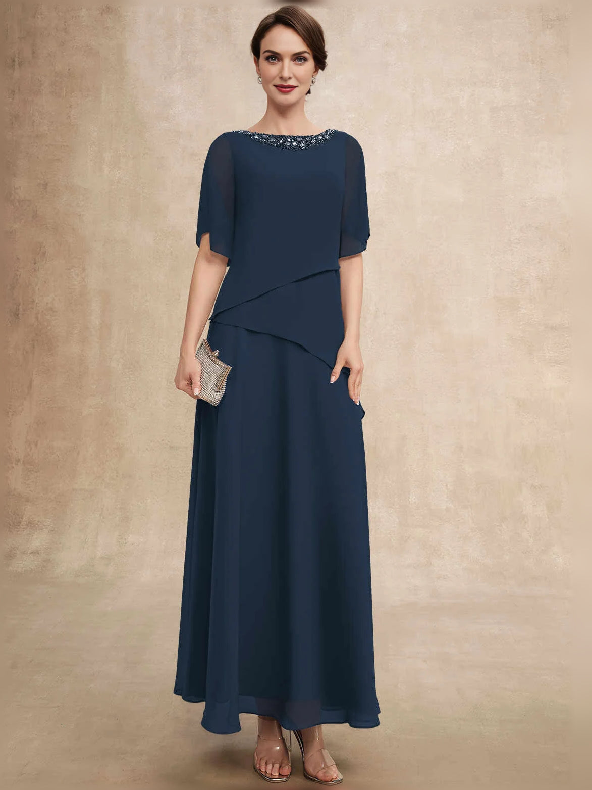 Dark navy chiffon formal dress with beaded boat neckline and layered draped panels