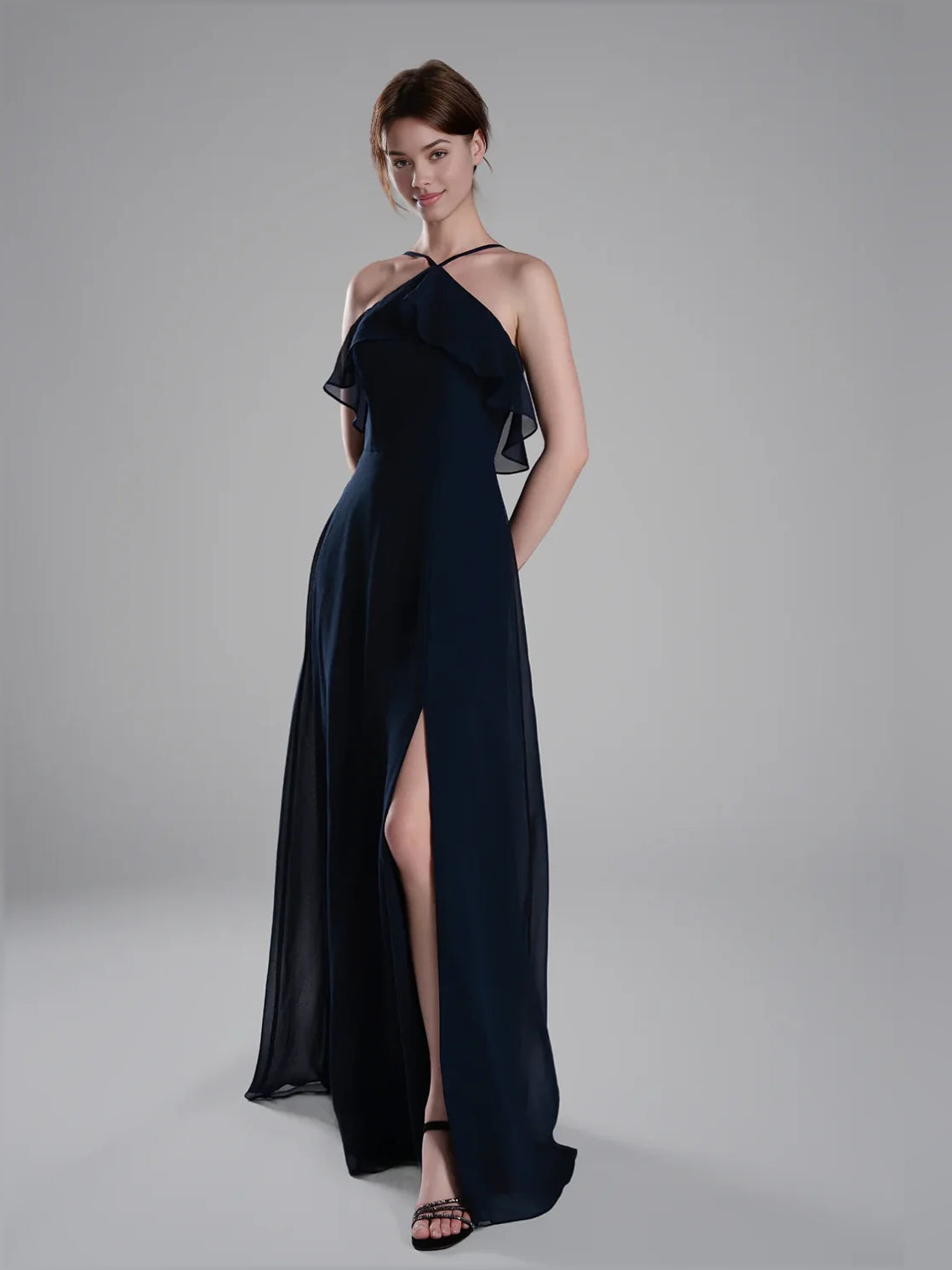 Dark navy chiffon bridesmaid dress with halter straps, ruffled bodice, and long side slit