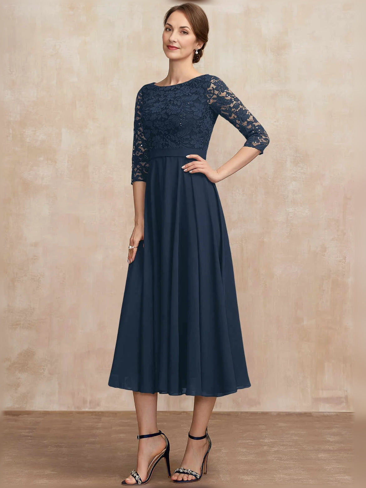 Navy sequined lace midi A-line dress with bateau neck and pleated chiffon skirt (front)