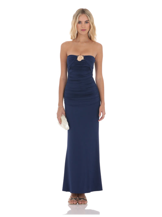 Navy strapless ruched maxi dress with gold buckle detail and fitted skirt