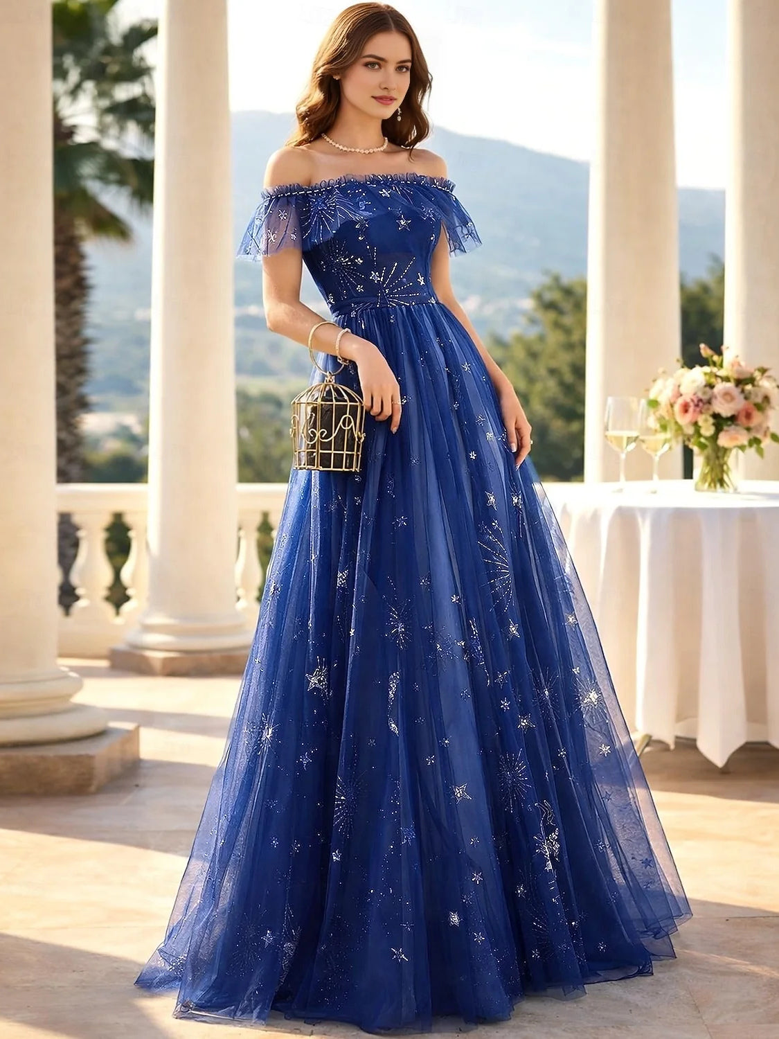 Navy off-shoulder corset prom dress with tulle skirt and short ruffled sleeve detail