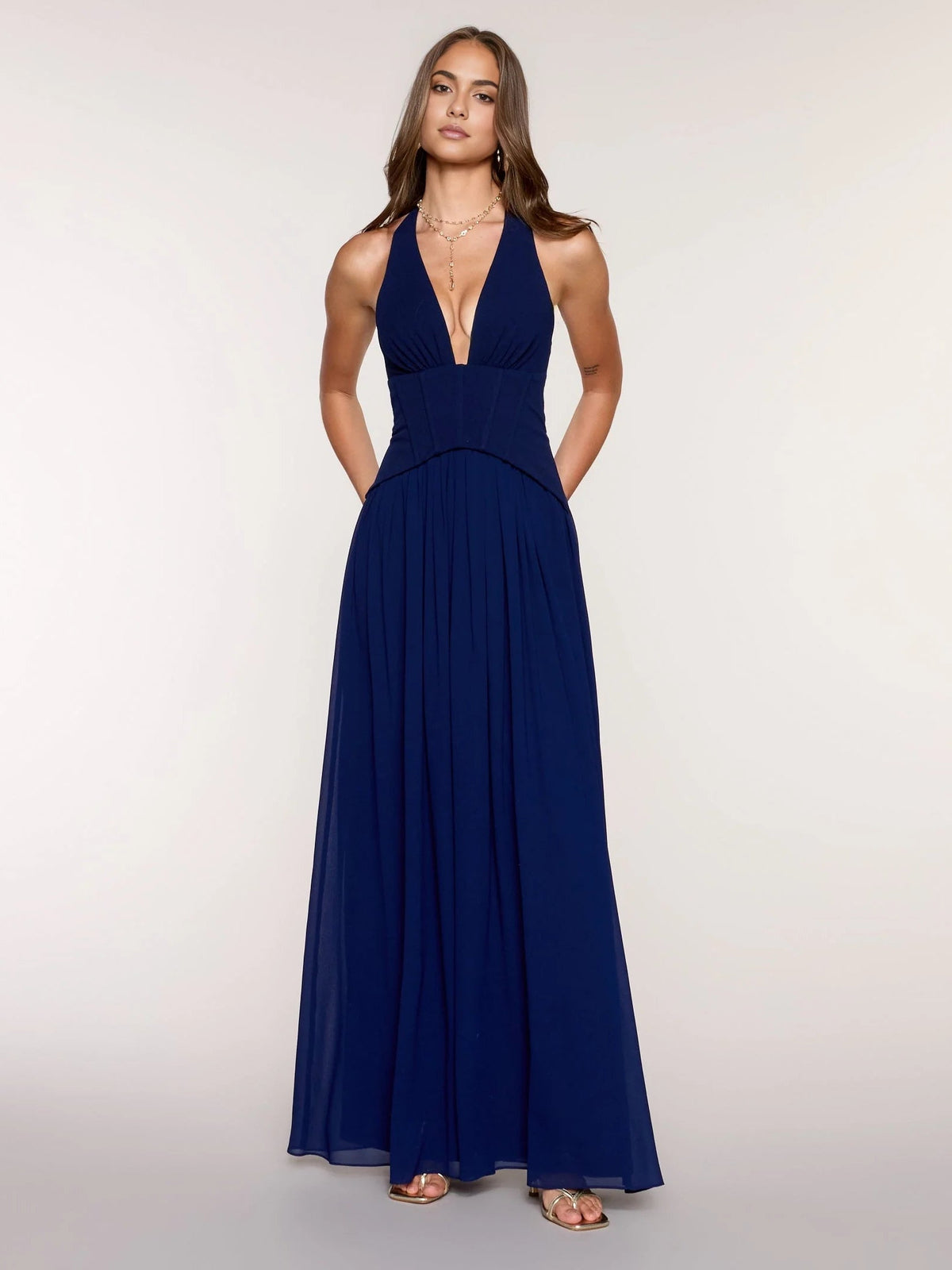 Navy chiffon prom dress, sleeveless V-neck corset bodice and pleated A-line floor-length skirt