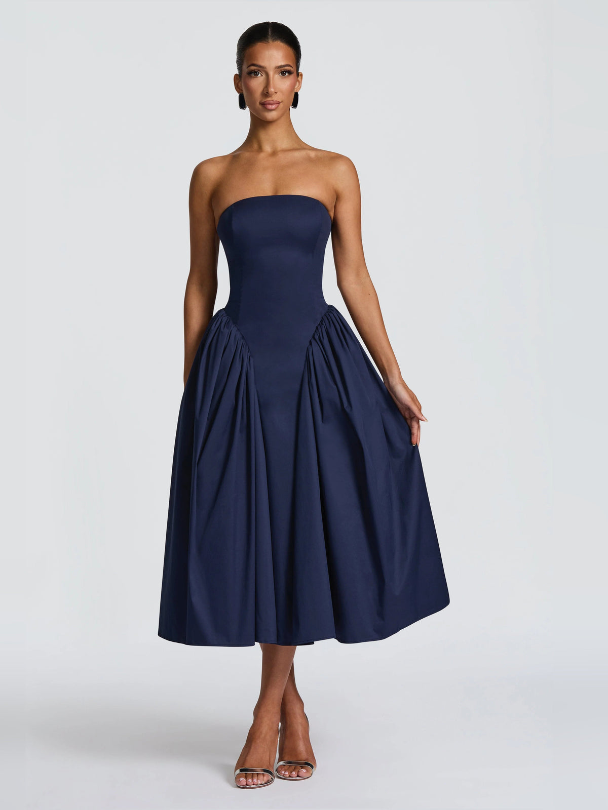 Navy strapless midi formal dress with sweetheart neckline and pleated skirt