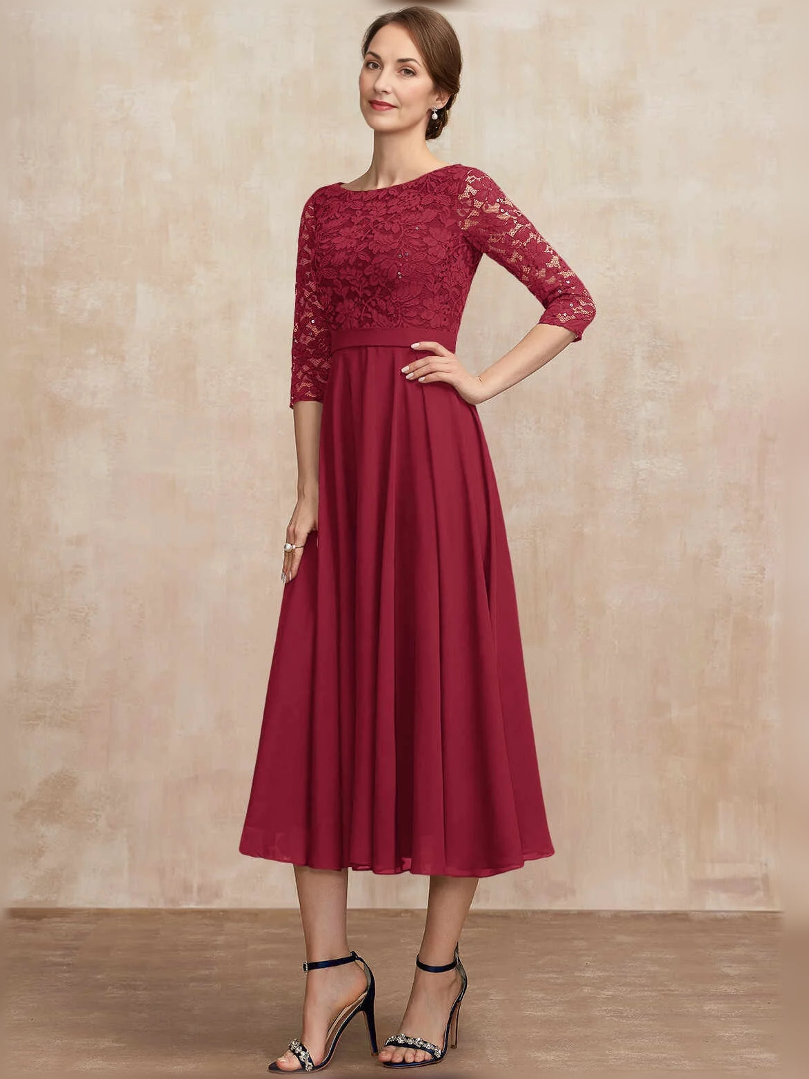Deep red pleated midi dress with bateau neckline, lace sleeves, and A-line chiffon skirt
