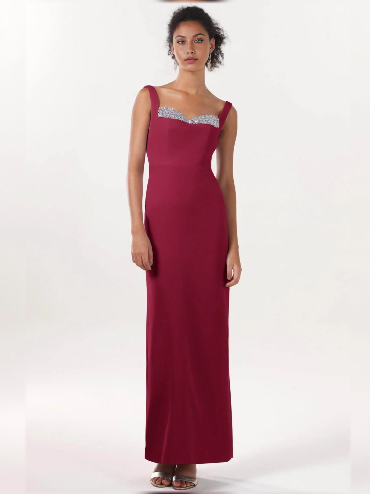 Floor-length sleeveless formal dress with sweetheart neckline and silver beaded bodice, deep red