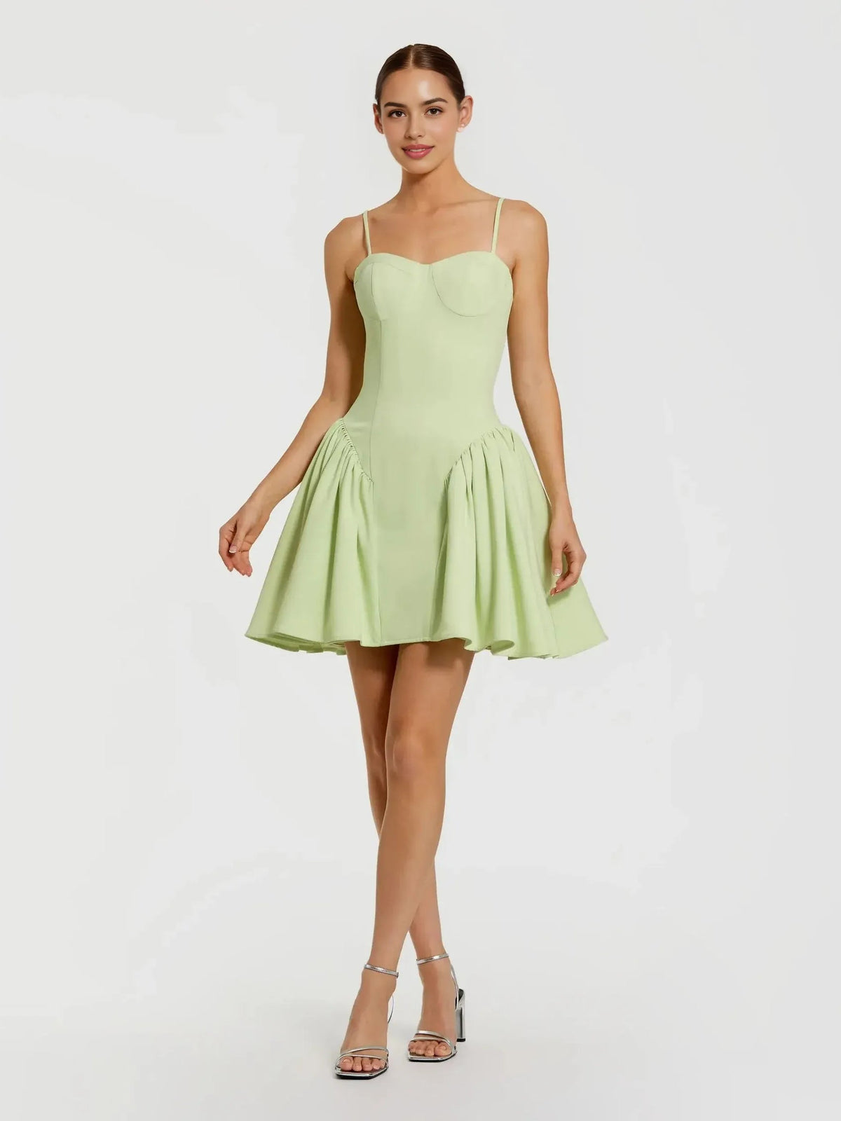 Sage green sweetheart A-line mini dress with spaghetti straps and layered pleats