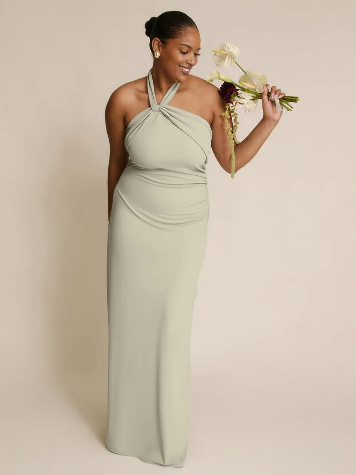 Sage green halter-neck sheath bridesmaid dress, floor-length with knotted strap detail