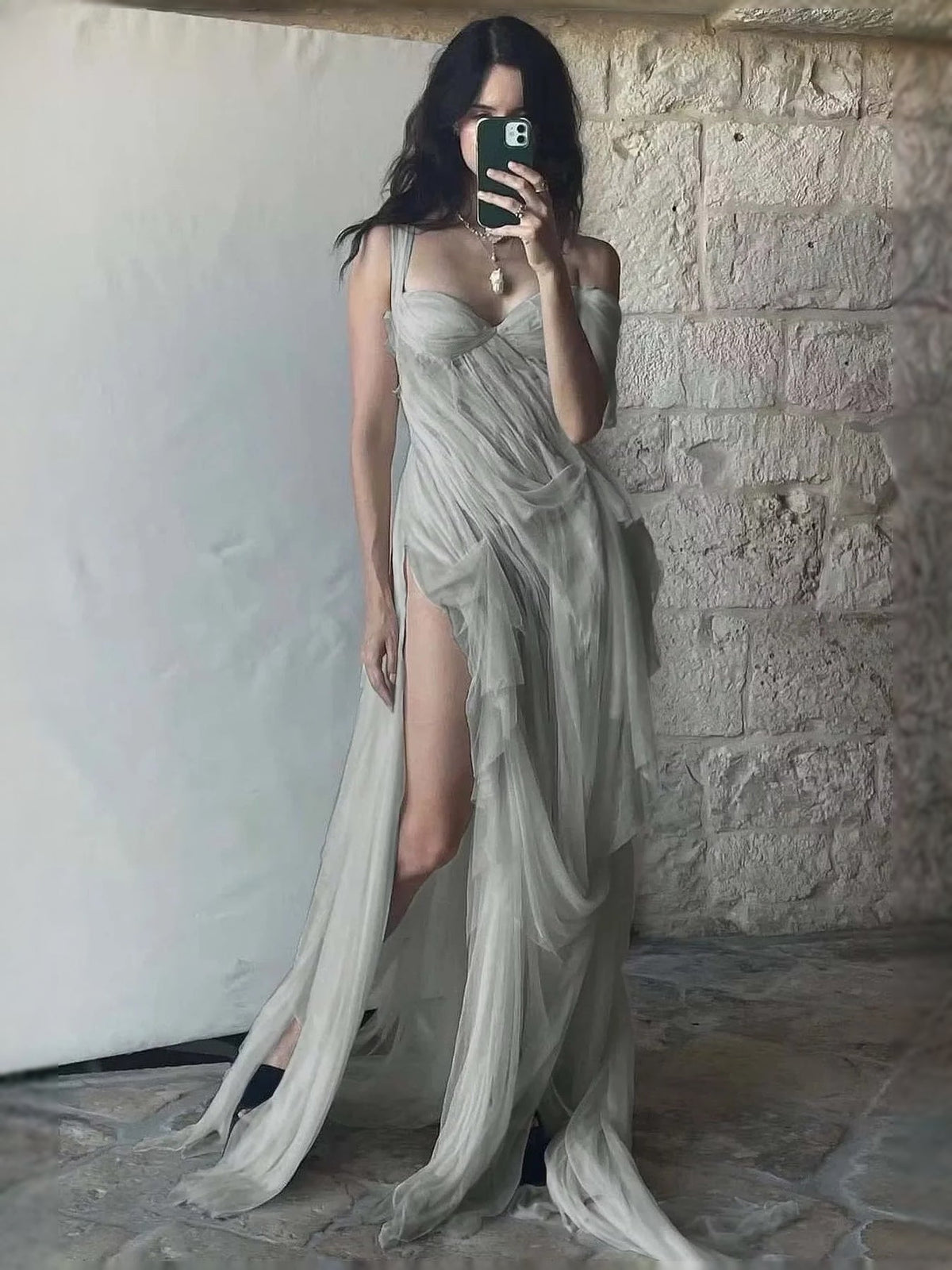 Sage green sweetheart prom maxi dress, front view with draped layers and slit