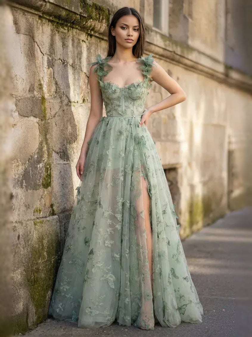 Mint green tulle prom dress with sweetheart bodice, cap sleeves, A-line skirt, side slit
