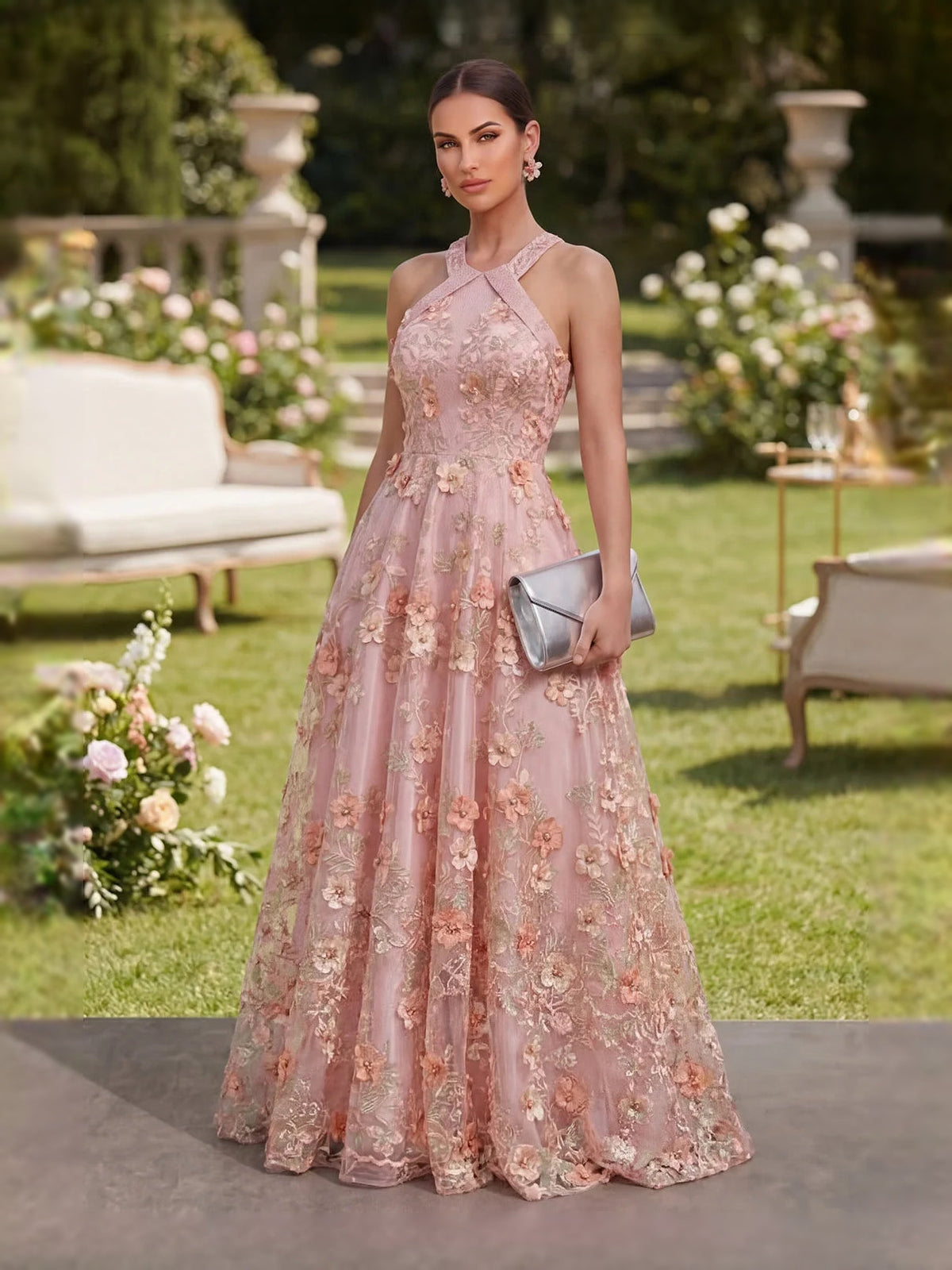 Dusty pink floral halter prom dress with appliqued flowers, flowing A-line tulle skirt