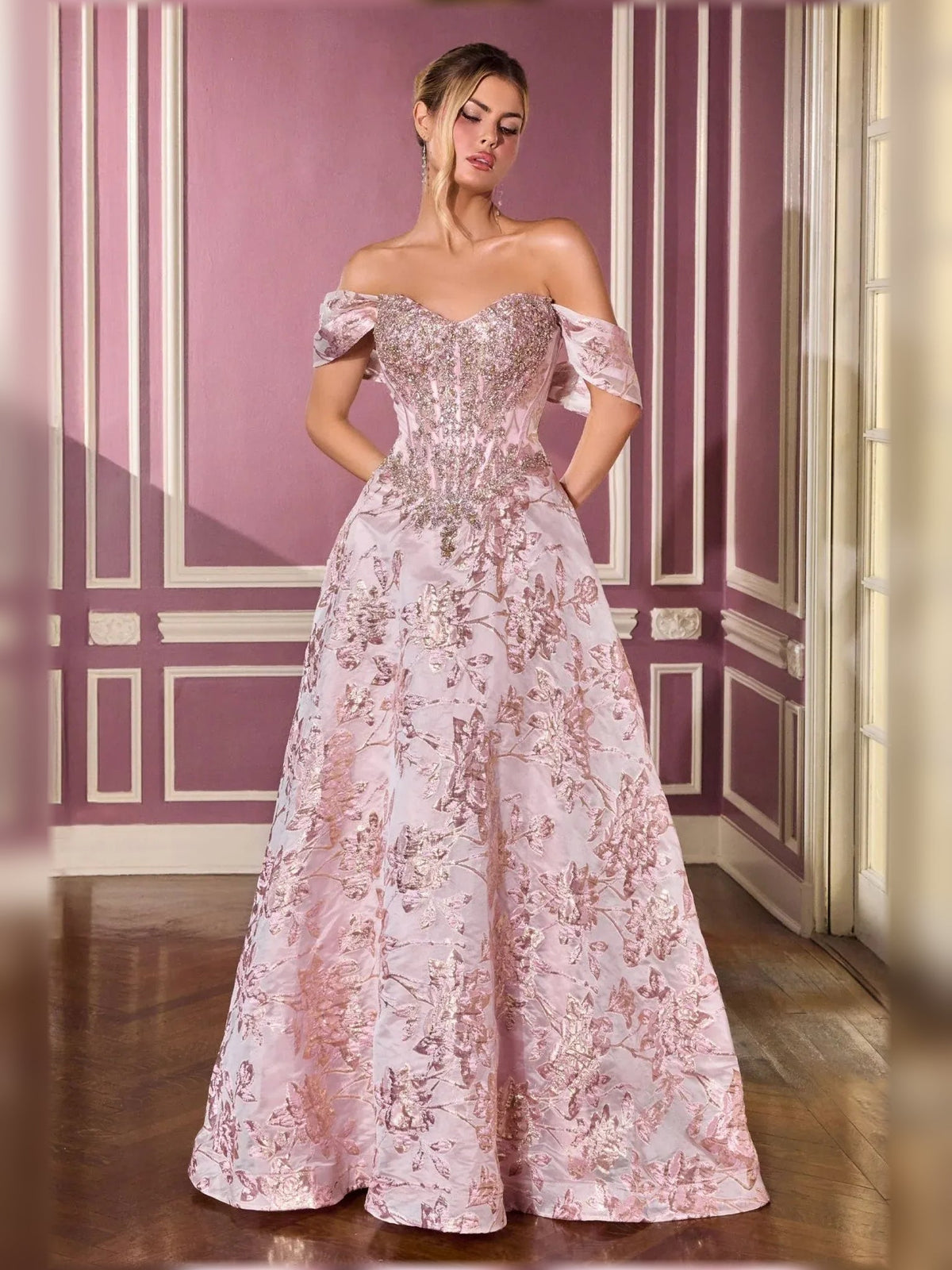 Pink off-shoulder sweetheart ball gown with sparkling beaded detail and full floor-length skirt
