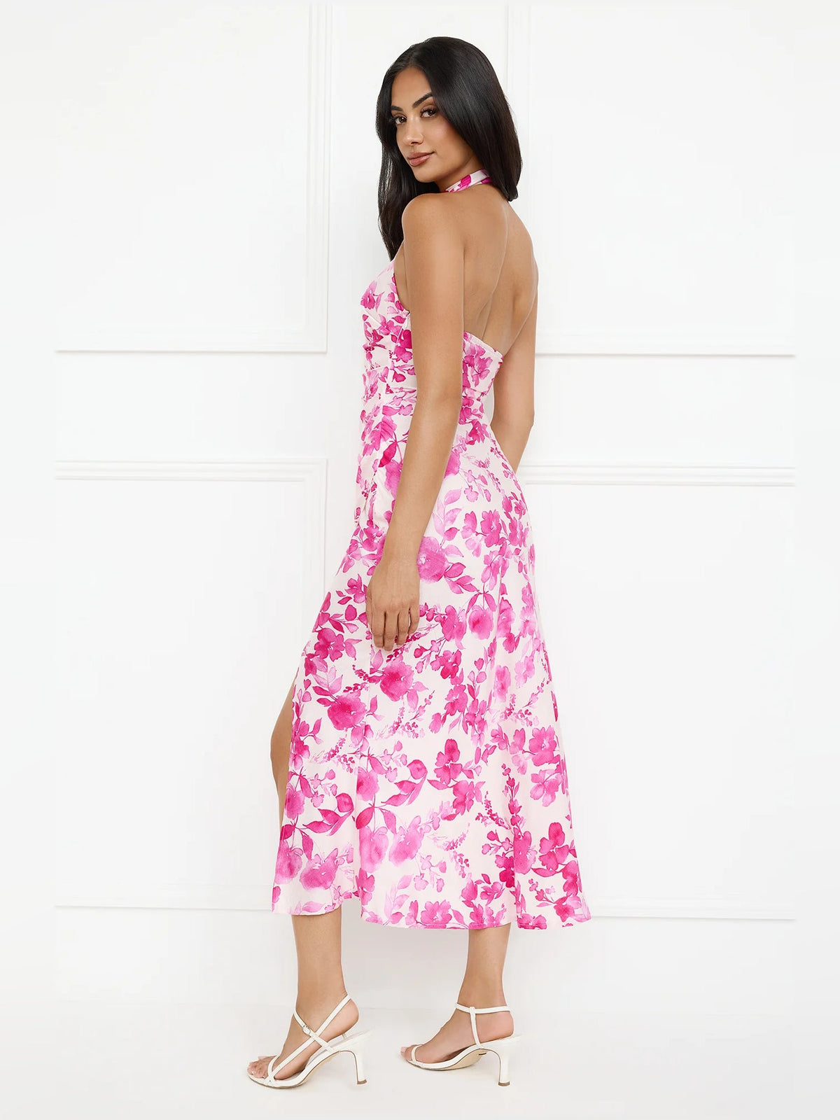 Pink floral halter midi dress back view with open halter straps