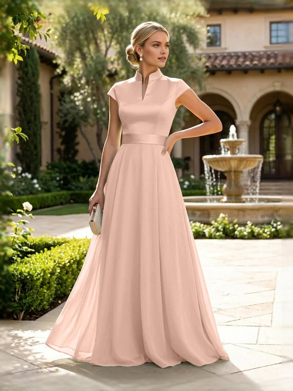 Blush pink satin A-line dress with sleeveless high neck and floor length