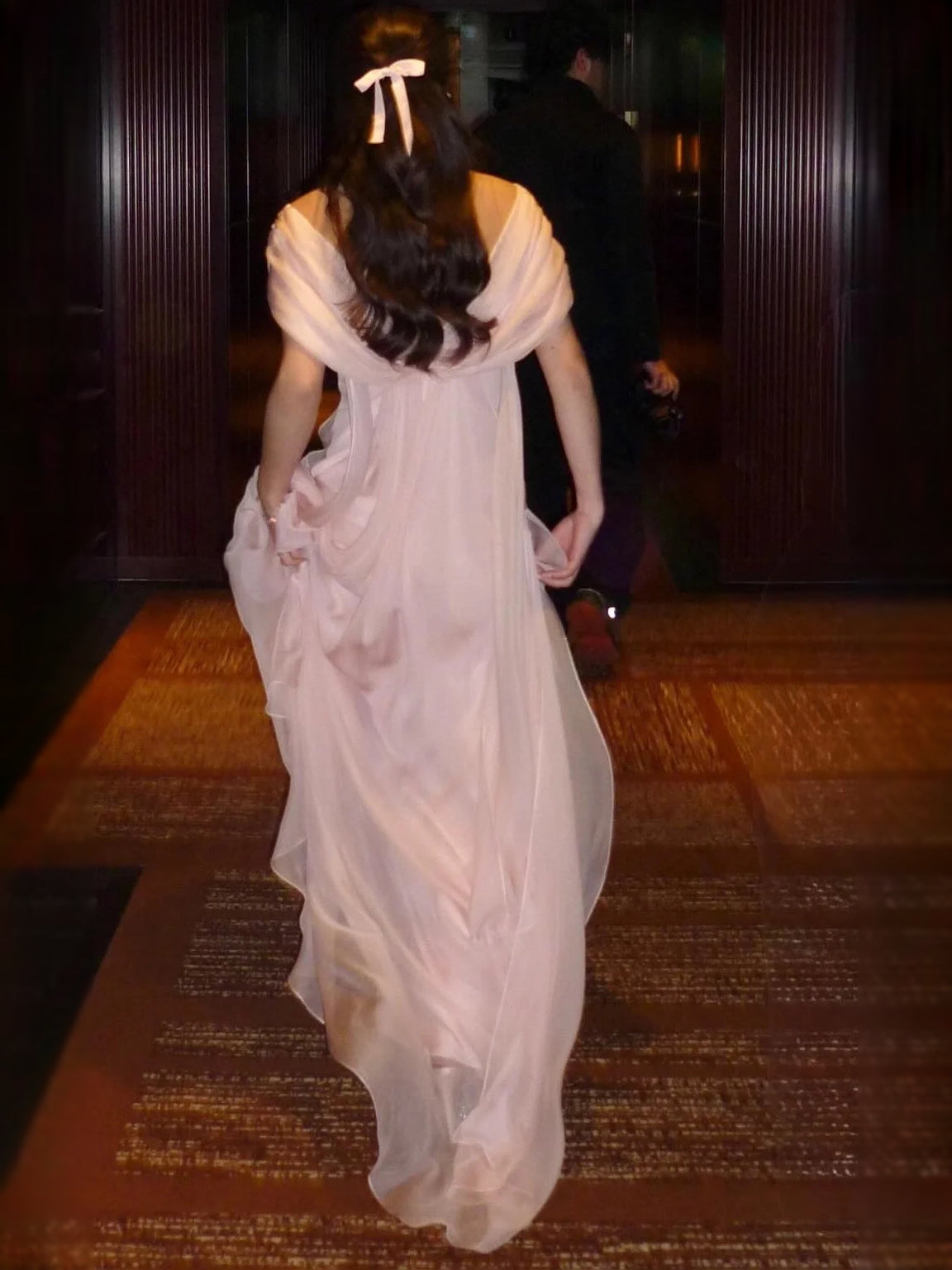 Floor-length white chiffon bridesmaid dress with draped ruched V-neck and A-line skirt