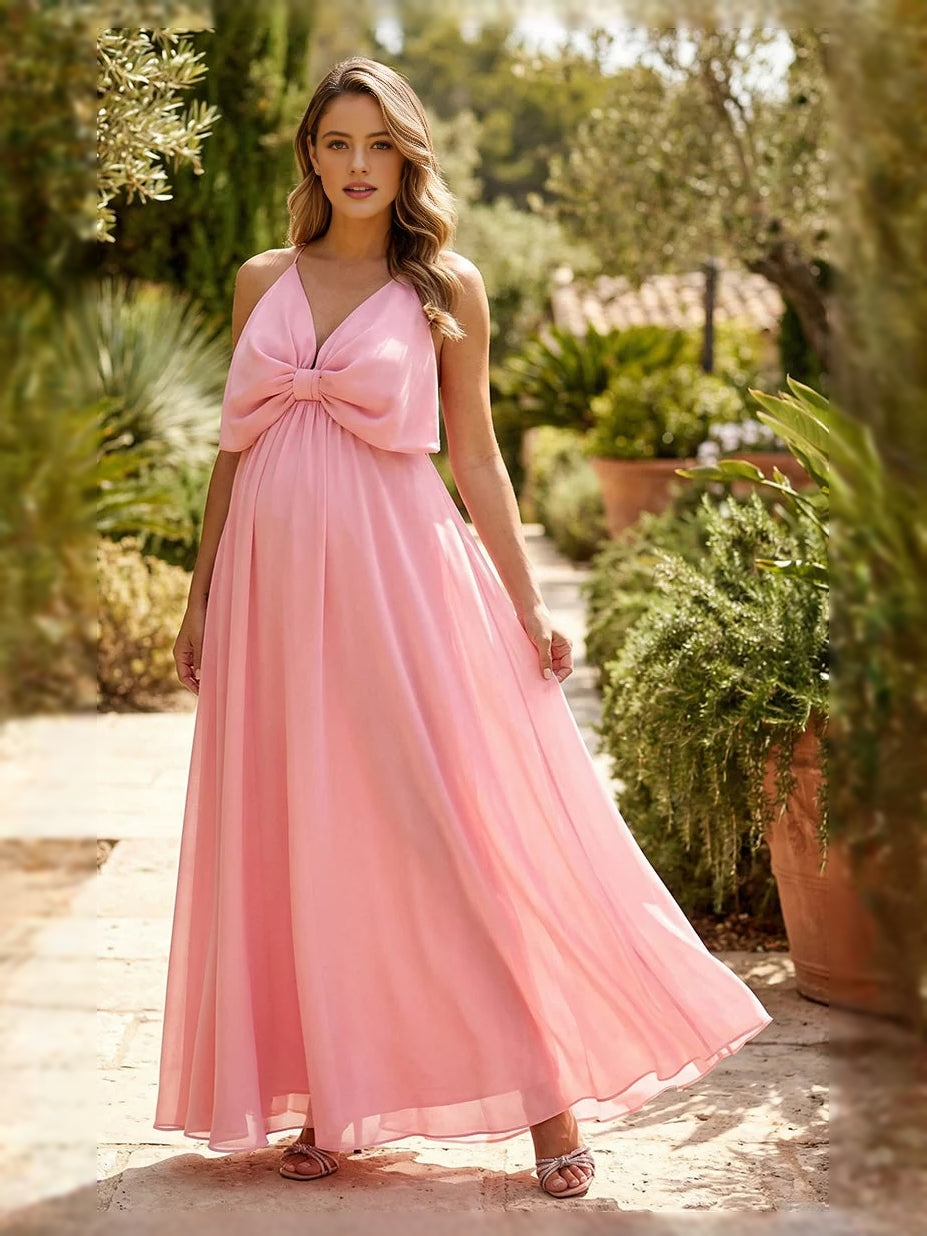 Blush pink chiffon V-neck A-line floor-length dress with front bow and flowing skirt