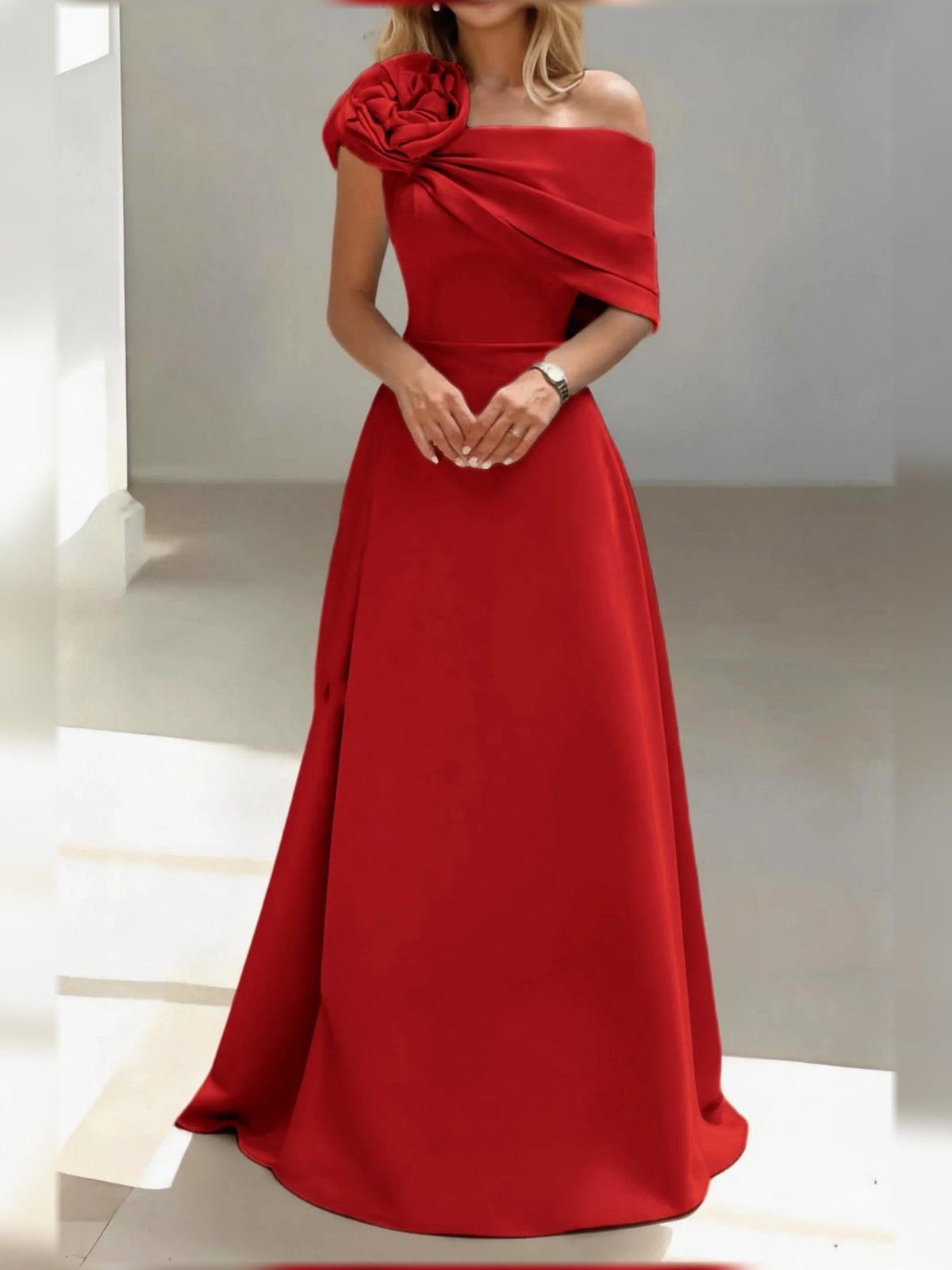 Dark red satin one-shoulder A-line gown with rosette shoulder drape