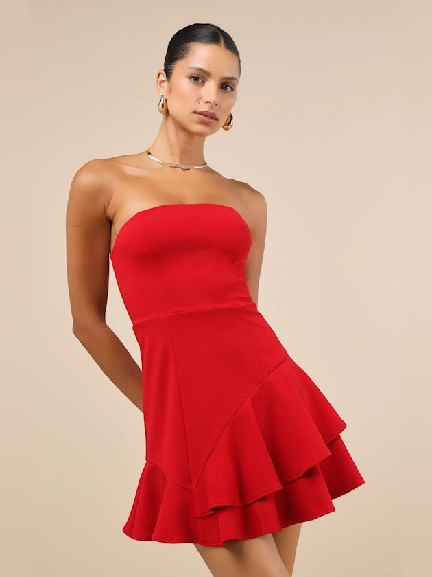 Red strapless mini dress with layered ruffle hem and fitted waist seams