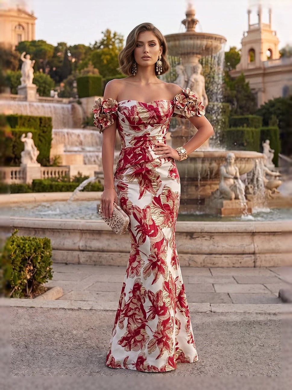 Red off-shoulder mermaid gown with ruched bodice and floral applique