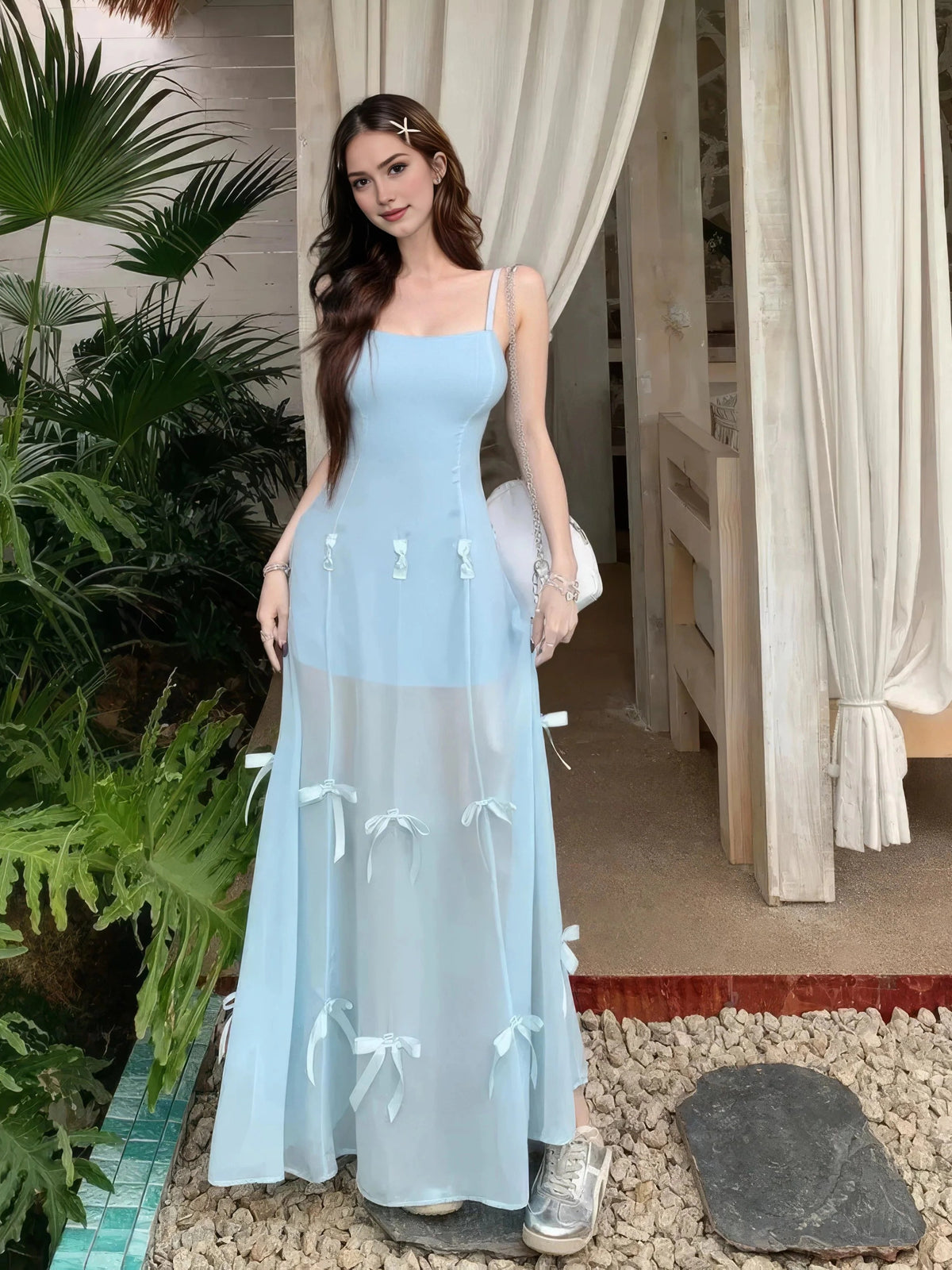 Light blue A-line maxi prom dress with scoop neck and thin straps, tiered bow skirt