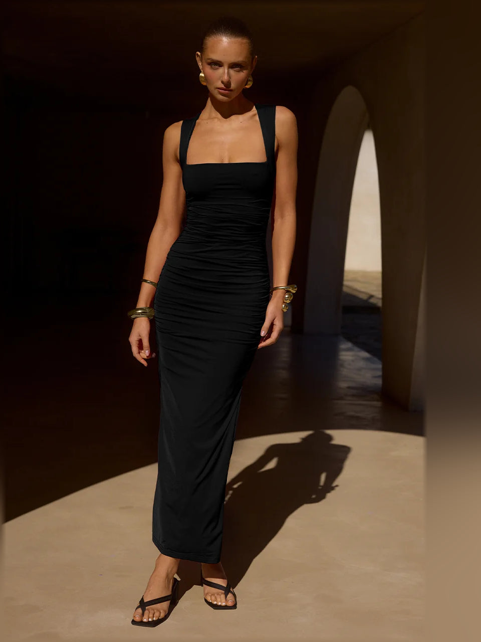 Black sleeveless midi formal dress with square neckline and ruched draped waist
