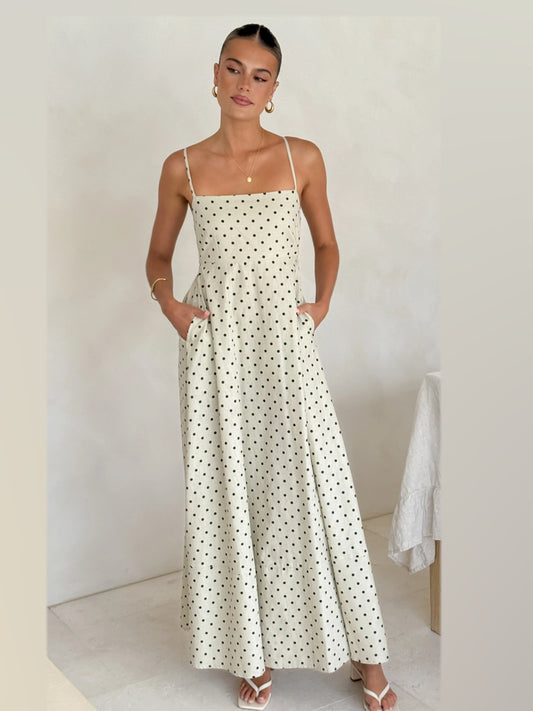 Beige polka-dot maxi dress with spaghetti straps, front view, wide skirt