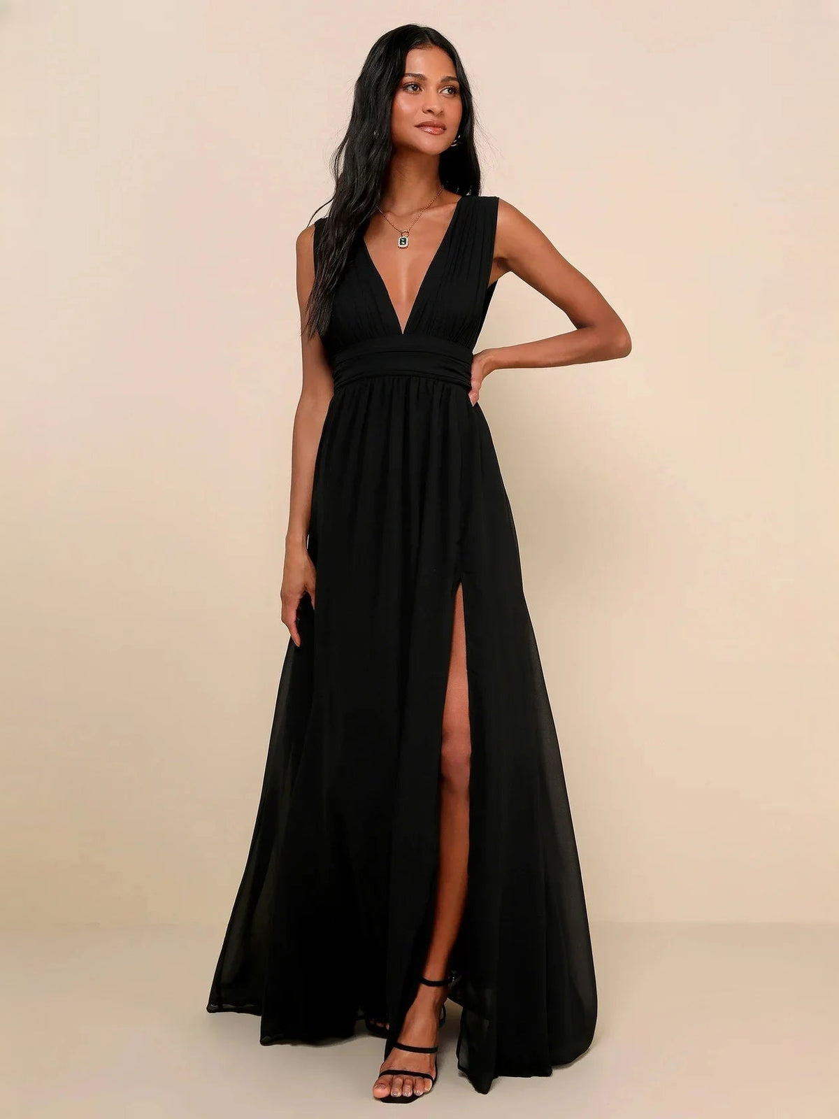 Black sleeveless V-neck A-line maxi dress with ruched waist and side slit