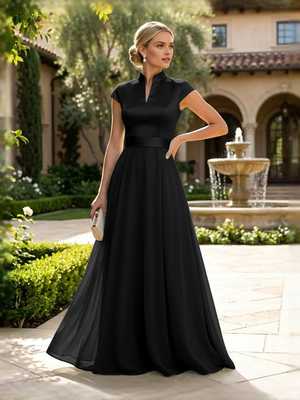 Black satin A-line dress with sleeveless high neck and floor length