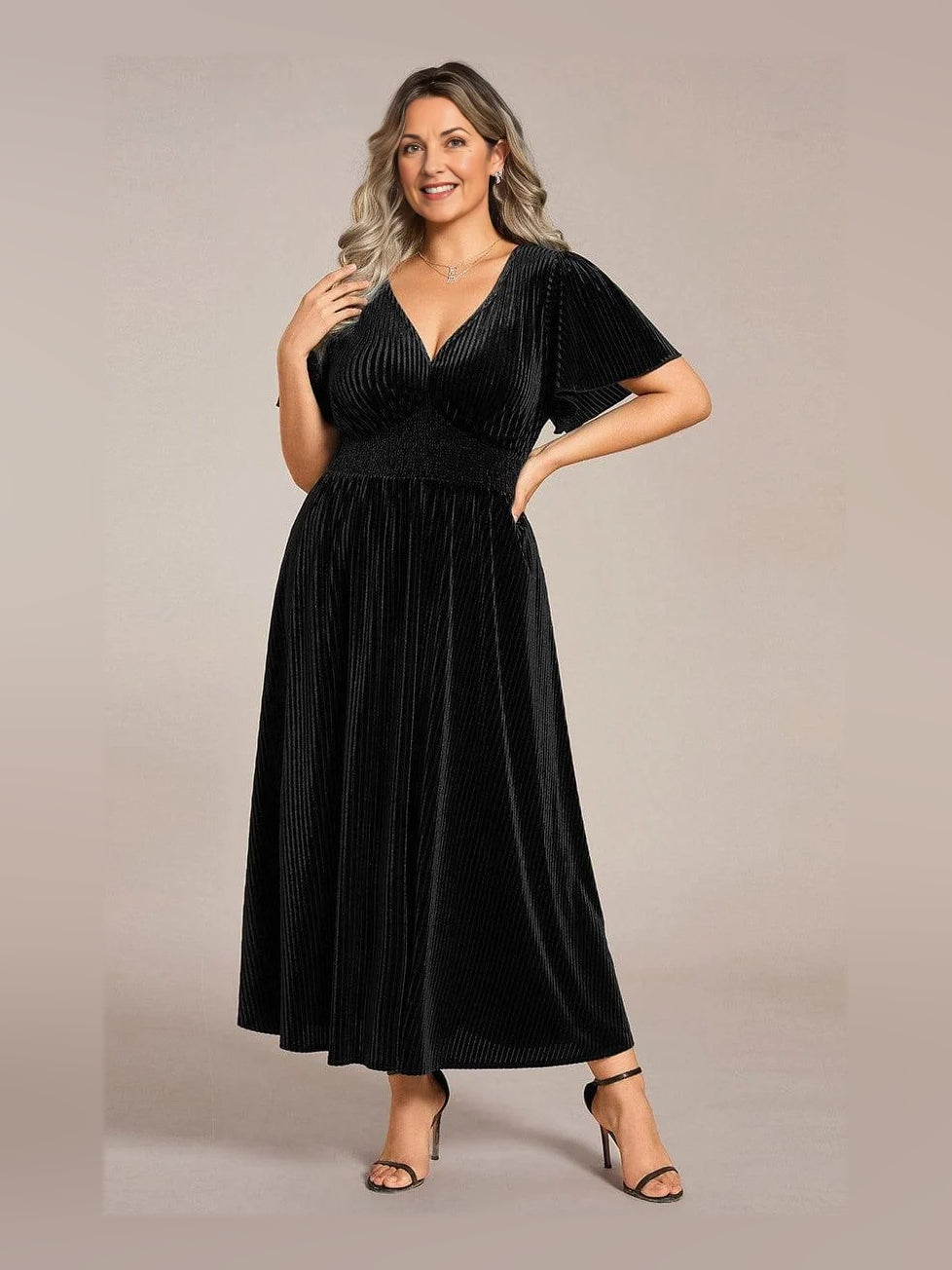 Black velvet midi A-line dress with V-neck, gathered waist, short flutter sleeves