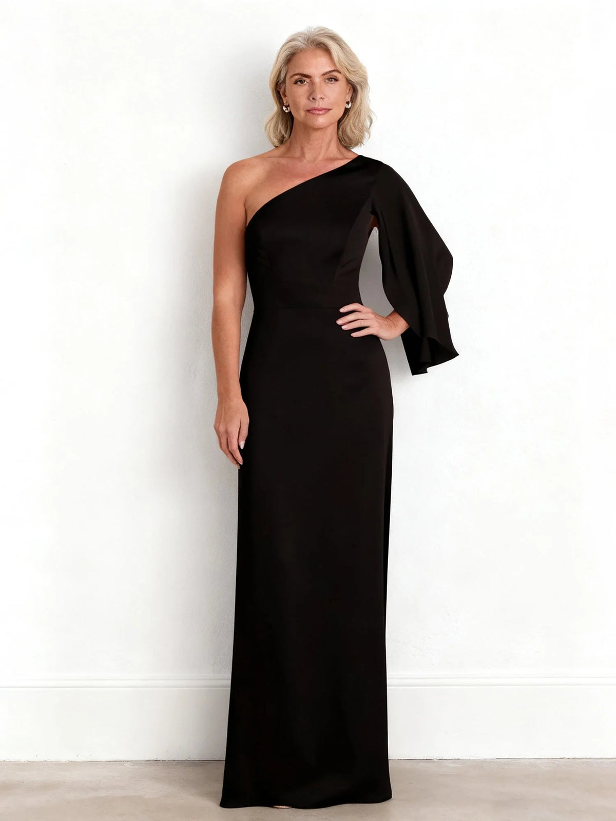 Black one-shoulder floor-length sheath dress with side drape and bell sleeve