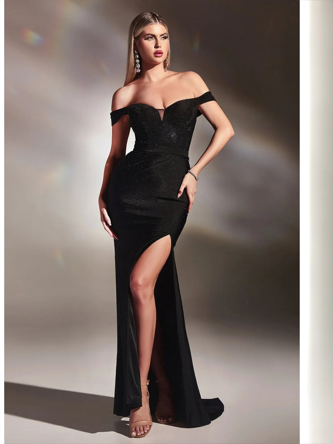Black off-shoulder fitted mermaid prom dress with glittering bodice and high slit