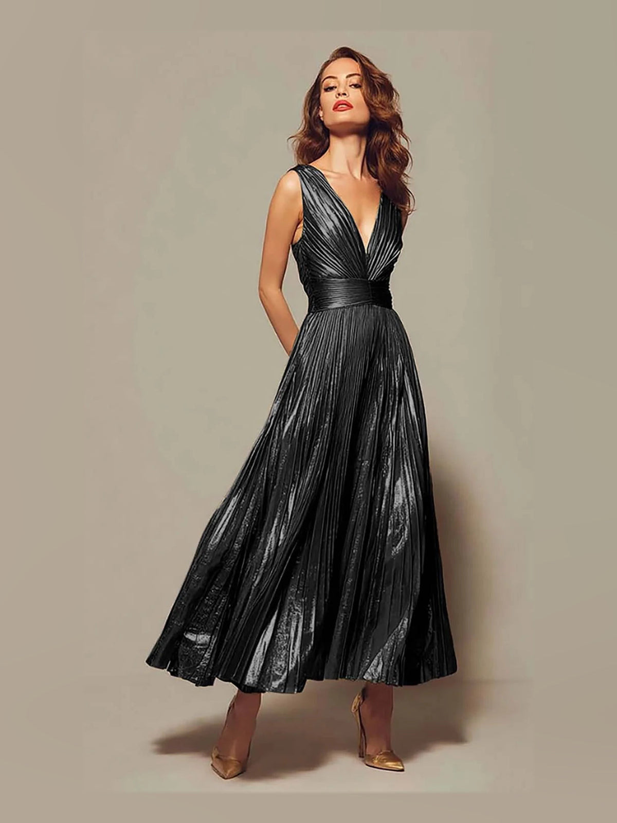 Black sequined pleated V-neck sleeveless A-line floor-length prom dress on model