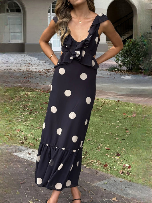 Black polka-dot midi dress with layered ruffle neckline and tiered skirt