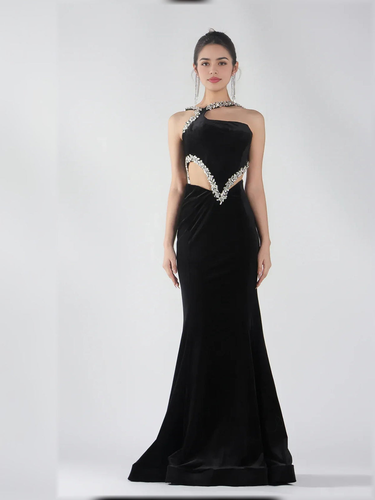 Black halter neck floor-length gown with cutout detailing and silver beaded neckline trim