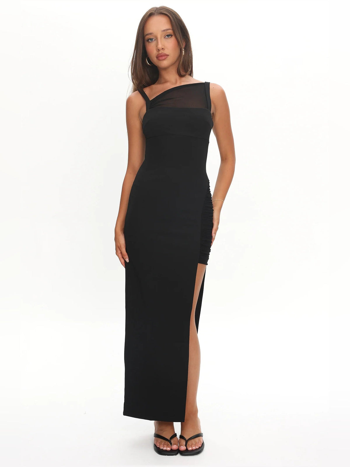 Black sleeveless midi formal dress with sheer yoke and front slit, straight skirt