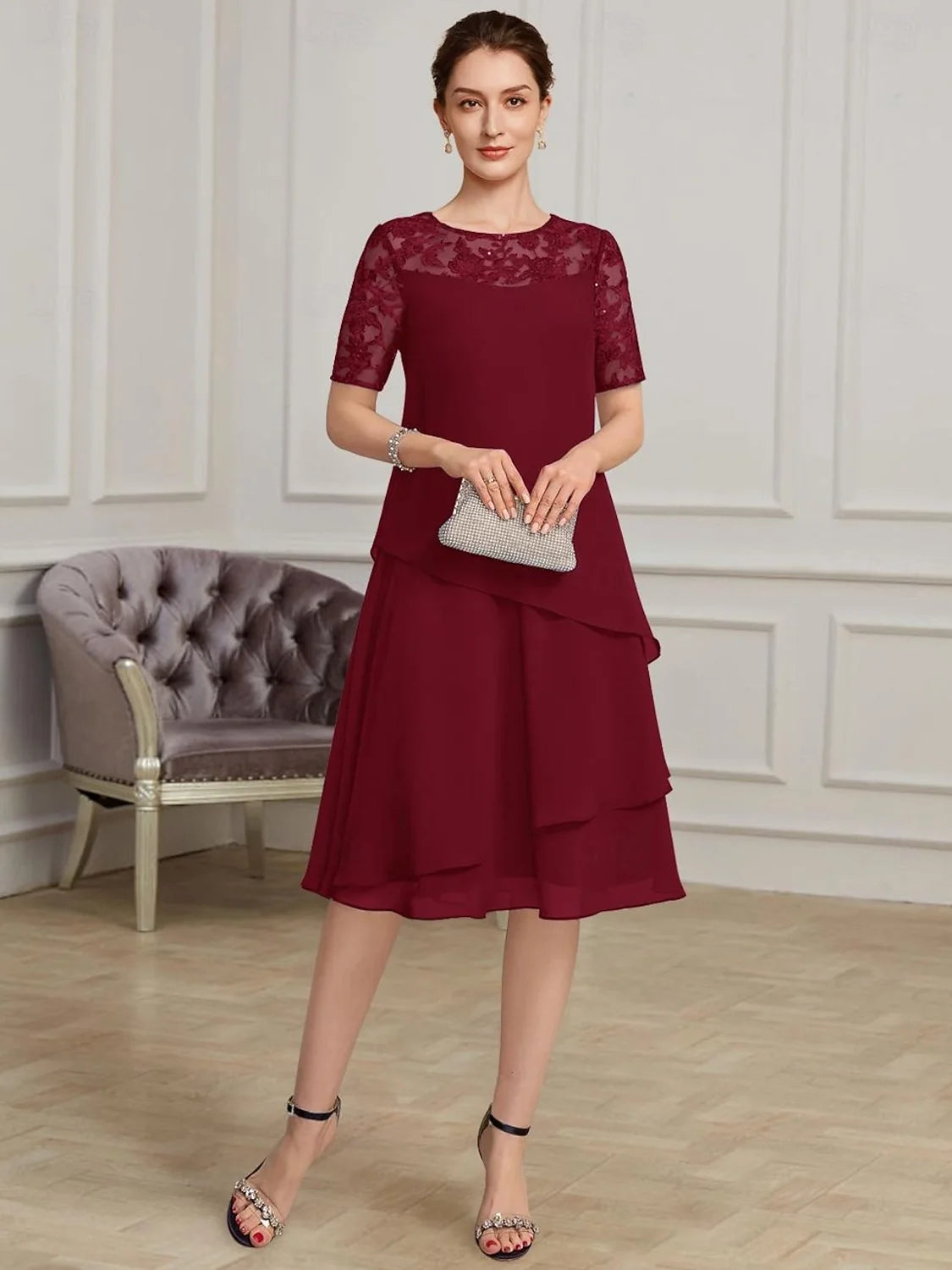 Burgundy layered chiffon mother-of-the-bride dress with floral lace short sleeves and A-line skirt