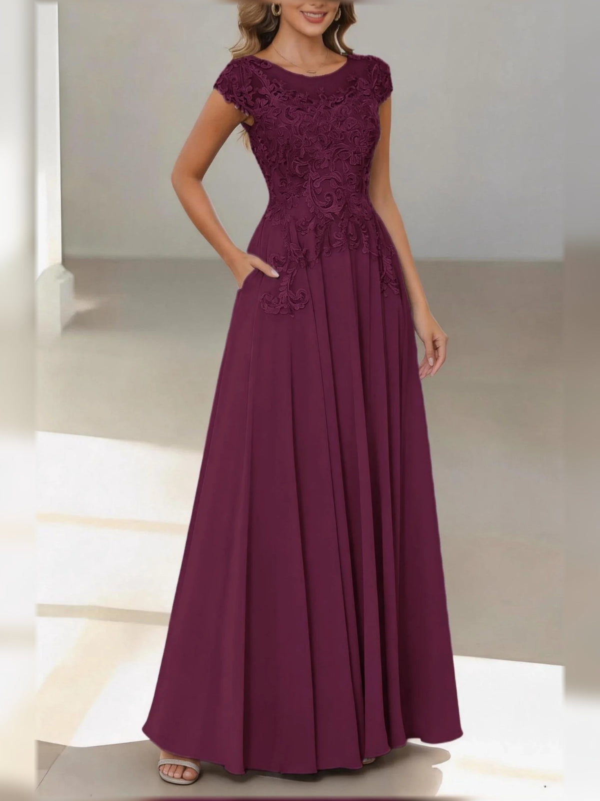 Burgundy satin floral A-line dress with bateau neck, cap sleeves, draped waist bow